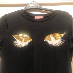 Darling Black with gold lashes . Adorable